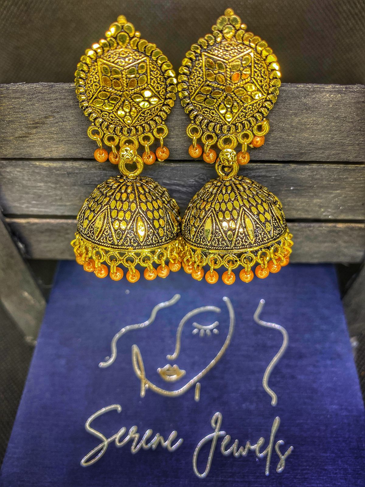 Gold Jhumka Earrings with Beads